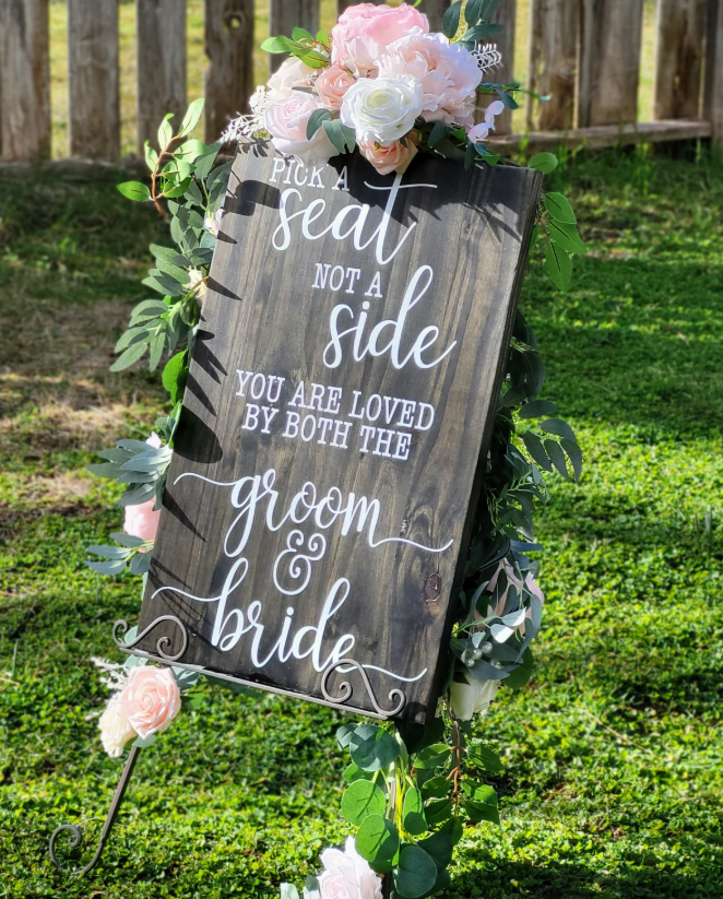 Wedding_Seating_Sign_Pick_a_seat_not_a_side_Ceremony_seating_sign_Loved_by_both_the_groom_and_bride_Wedding_Aisle_Decor_Rustic_Wood_Wedding