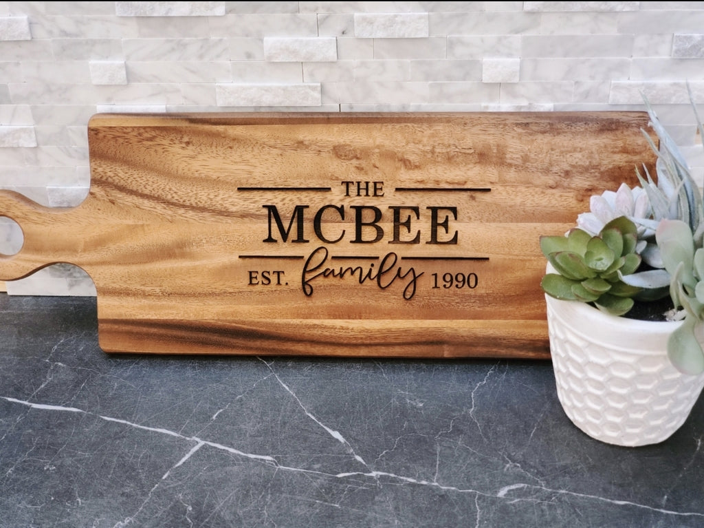 Laser engraved wood serving platter with personalized name and date