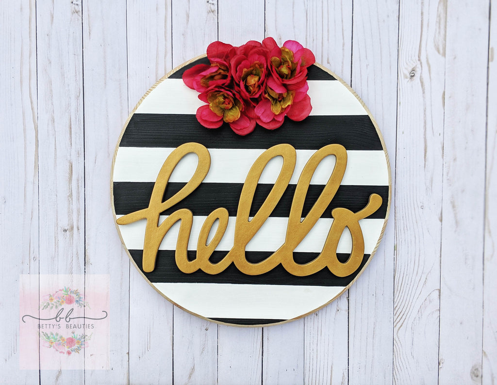 black, white, red and gold hello wood round 