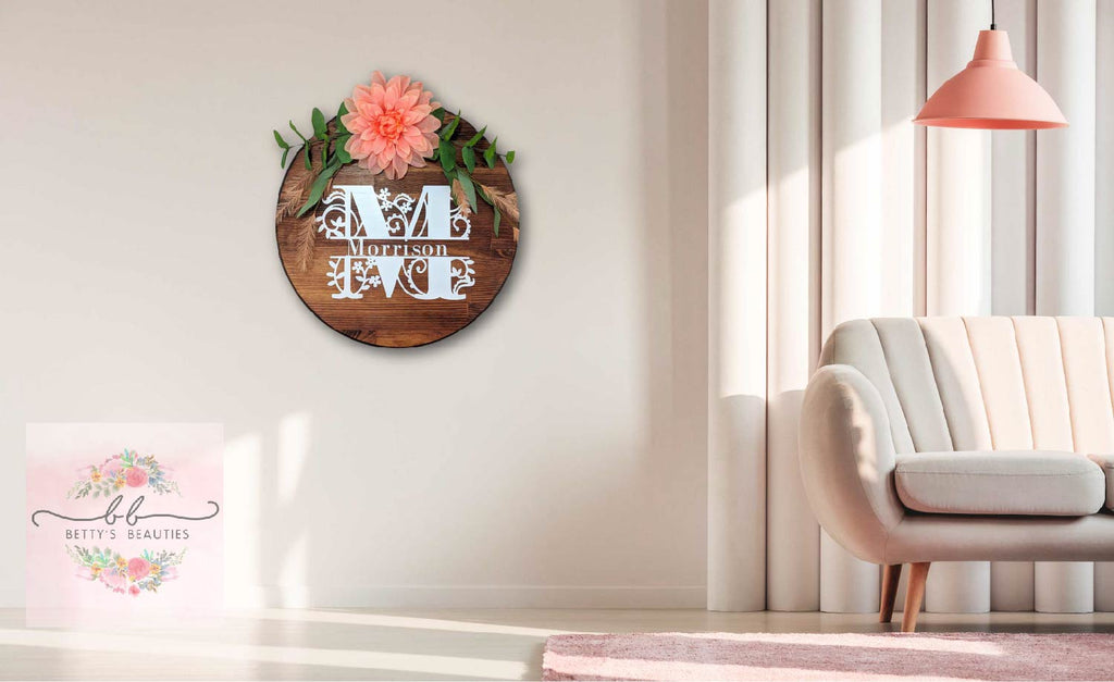 Personalized family name monogram hanging in a beautiful family living room