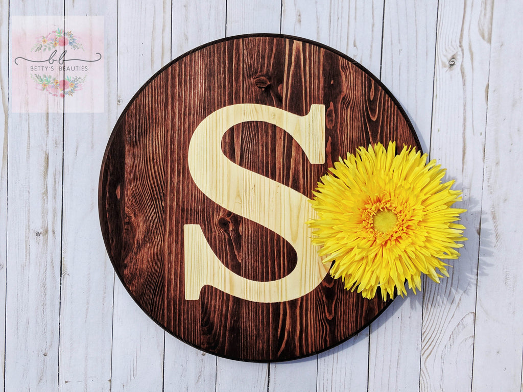Personalized hanging wood round stained monogram with a sunflower