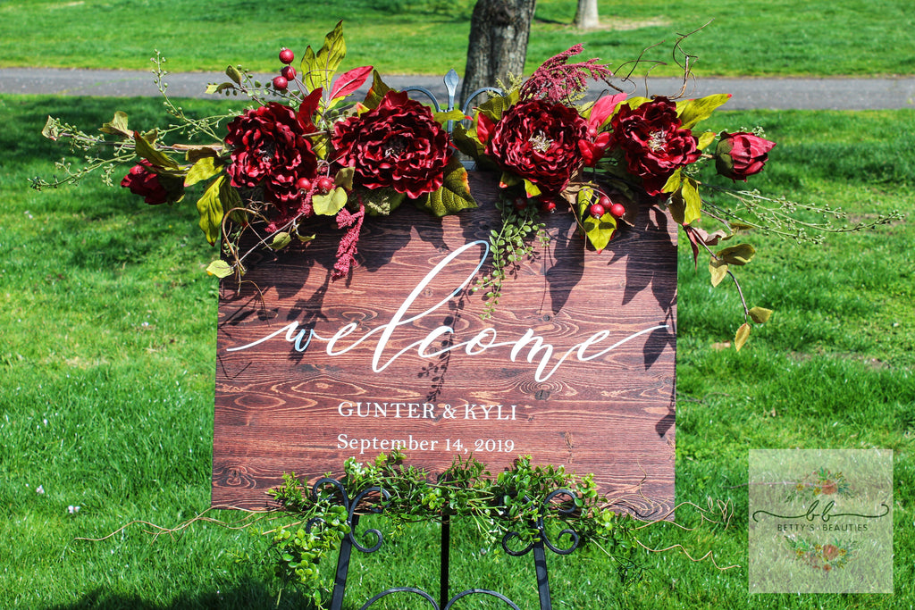 Personalized wedding decorations that include personalized bride and groom names with wedding date 